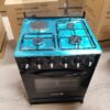 Volsmart 60x60 Jet 3+1 Standing Cooker with three gas burners, one hotplate, electric oven, grill, rotisserie, and jet valve technology. Durable black body with silver top and strong glass lid. Available in Kenya on Jesoko.com.