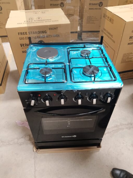Volsmart 60x60 Jet 3+1 Standing Cooker with three gas burners, one hotplate, electric oven, grill, rotisserie, and jet valve technology. Durable black body with silver top and strong glass lid. Available in Kenya on Jesoko.com.