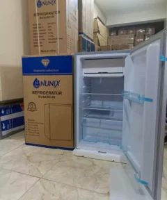 Nunix BC-92 92L Single Door Refrigerator with stainless steel finish, compact design, and adjustable thermostat.